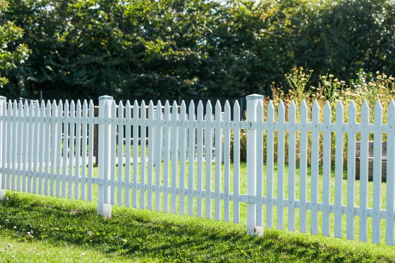 white fence in the yard